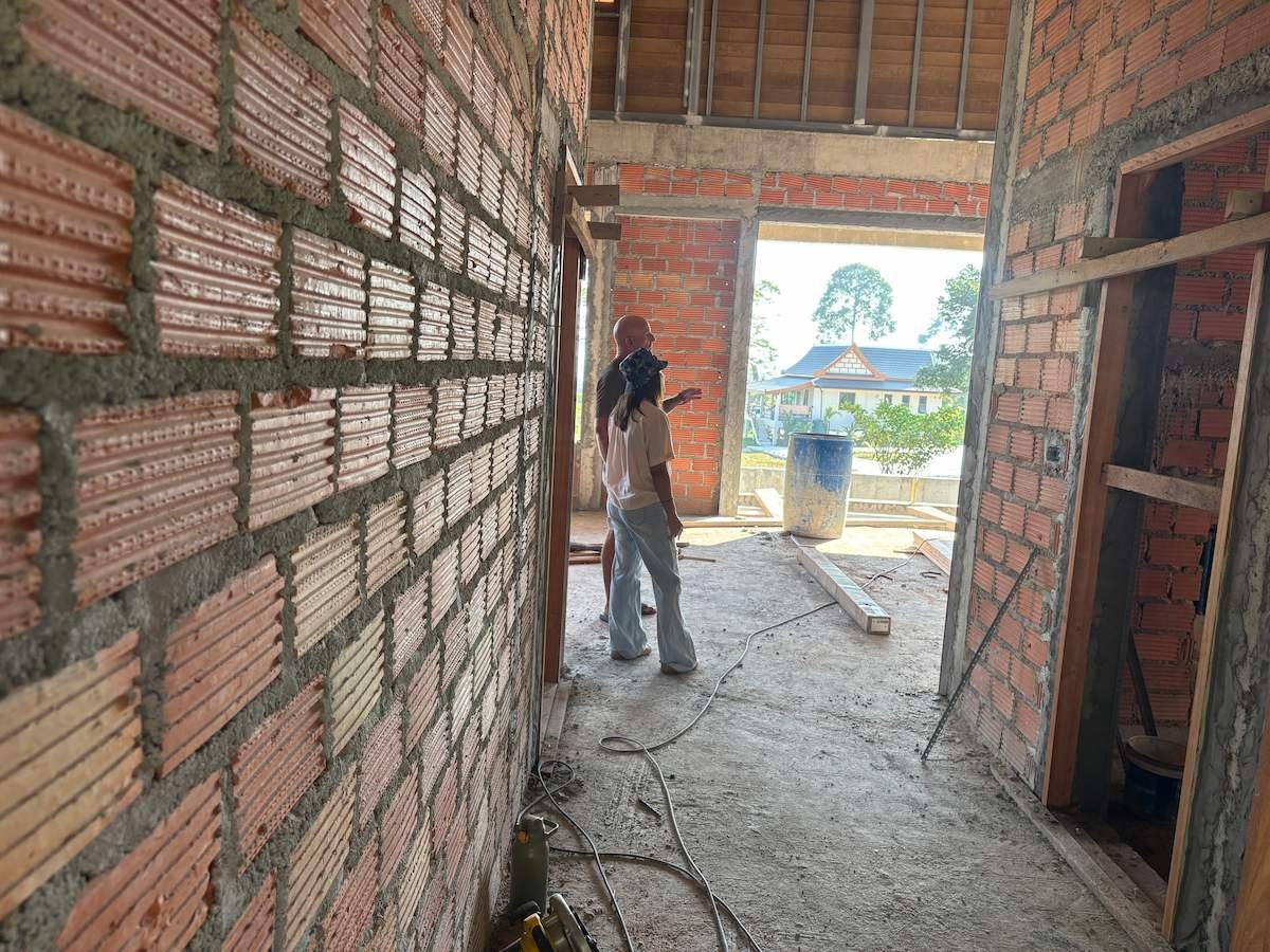 Nay Sirirat, architect, on site with the Ban Makham villa build during construction